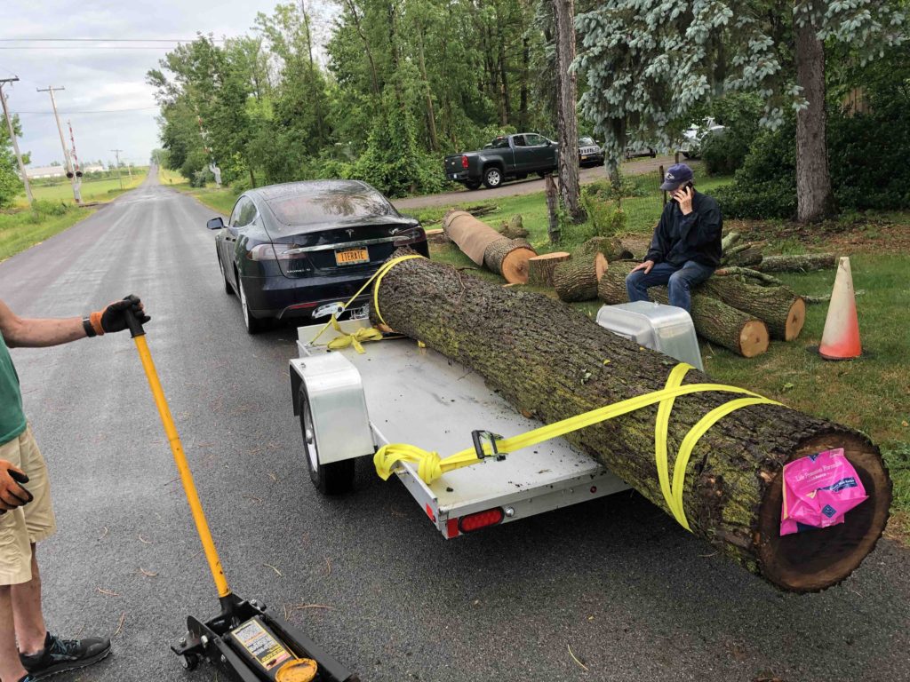 Tesla Towing Huge Log