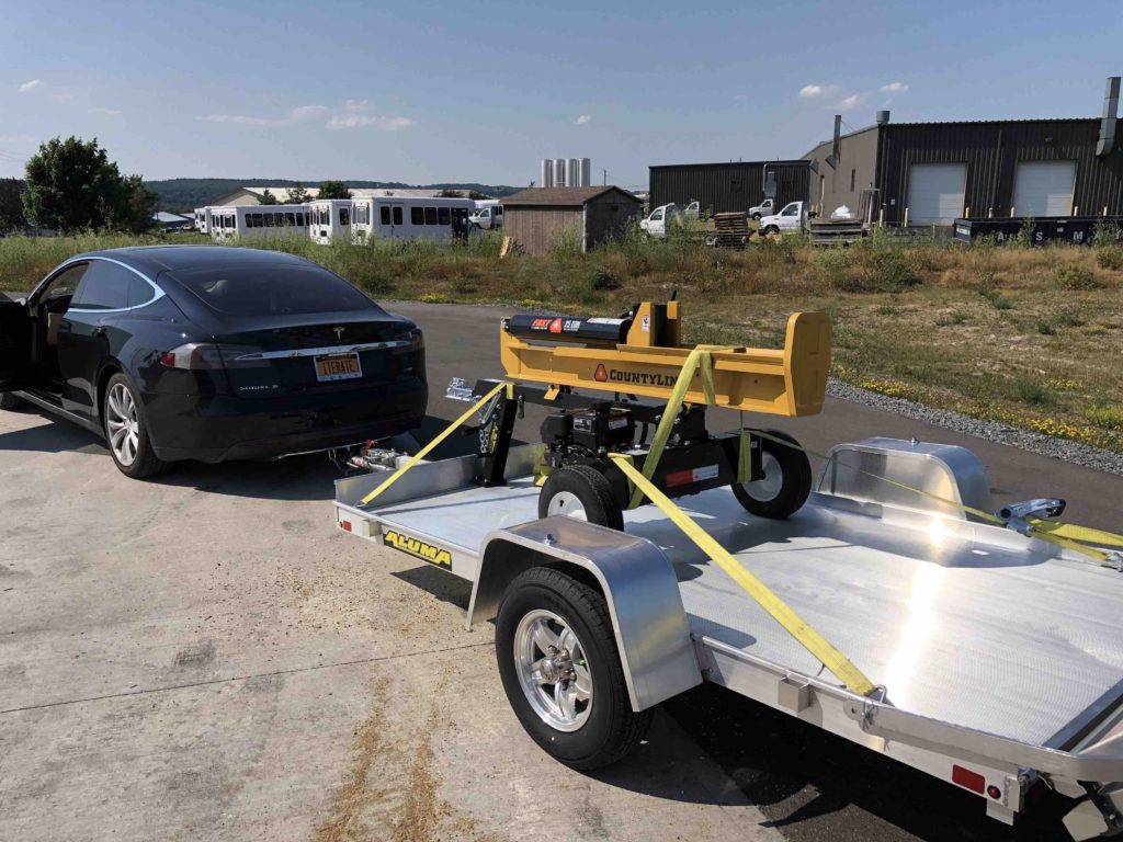 Tesla Towing a Log Splitter